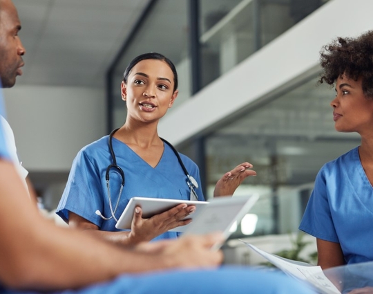 Shot of a group of medical practitioners having a discussion in a hospital