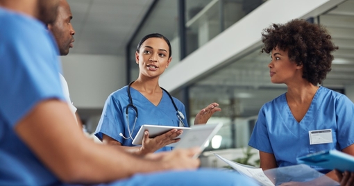Shot of a group of medical practitioners having a discussion in a hospital
