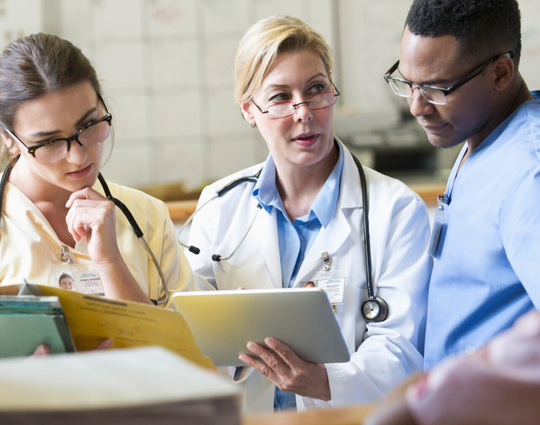 Shot of a group of medical practitioners having a discussion in a hospital