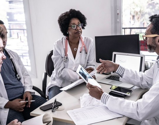 Doctors discusses something during doctor's conference / meeting