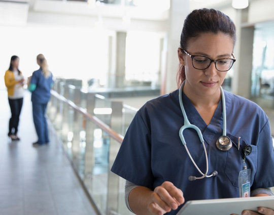 Clinician on a tablet