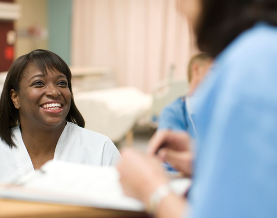 Healthcare professional at a desk