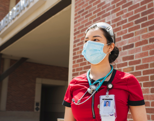 Worker outside hospital ER